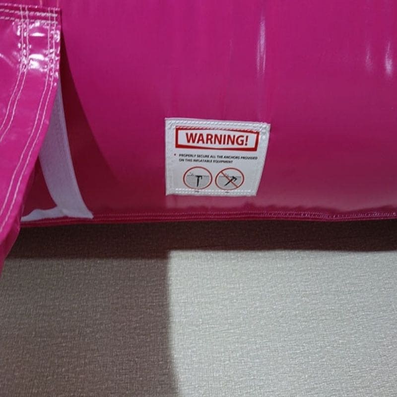 Warning Sign on 17 Foot Pink Castle Bounce House Combo