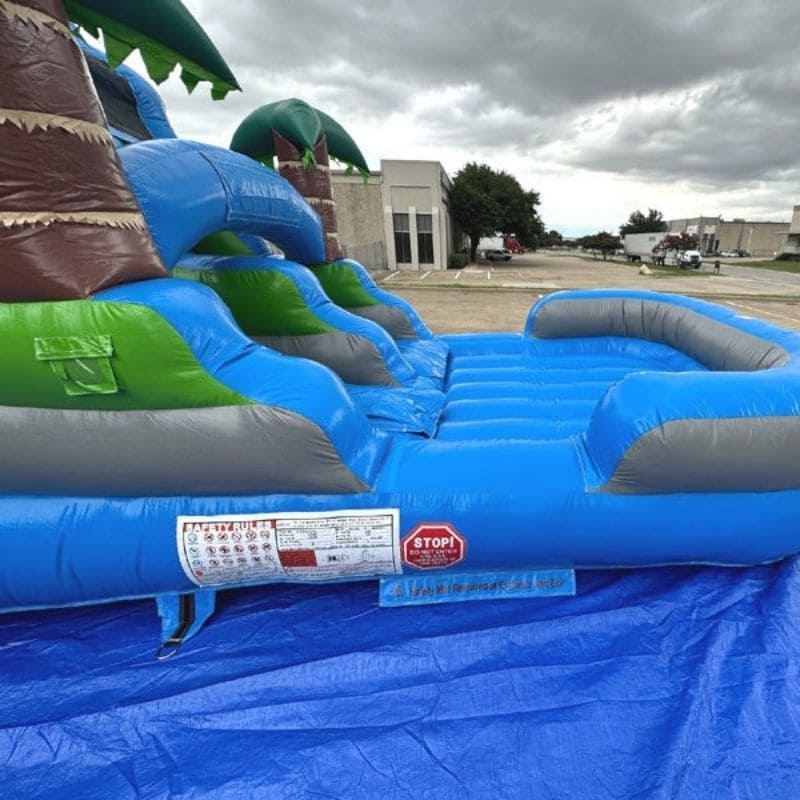 Right Exit View of Eagle Bounce 15 FT Blue Palm Tree Slide Wet and Dry