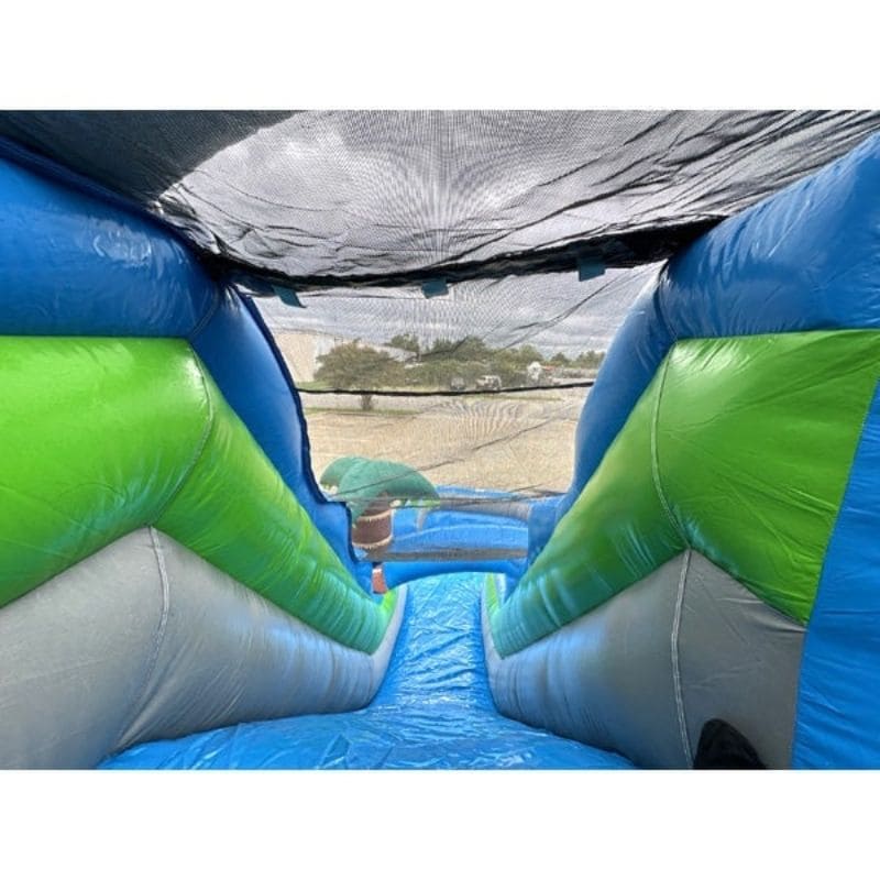 Slide Overlook View of Eagle Bounce Blue and Green Water Slide with Palm Trees