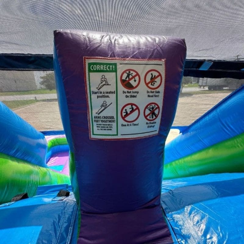 Slide Instructions on Eagle Bounce Purple Palm Tree Dual Lane Water Slide