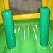 Moonwalk USA Fiesta Castle Bounce House in Green and Yellow Inside Beam View