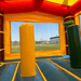 Moonwalk USA Palm Tree Bouncy House in Red and Yellow Obstacle Beam Inside View