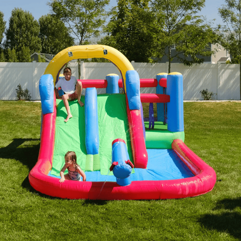 Avyna Royal Wave Bounce House 1 with Inflatable Water Slide Front View Outside with Kids Playing