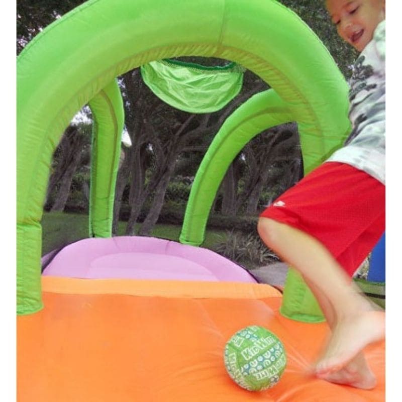 KidWise Arc Arena II Sport Bouncer Inflatable Sports Residential Bounce House Kid Kicking Ball into Goal Close Up View