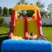 Avyna Royal Tower Slide 1 Inflatable Slide Front View with Kids Playing