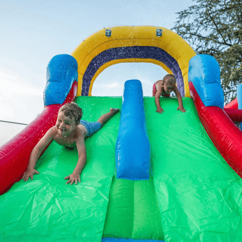 Avyna Royal Wave Bounce House 1 with Dual Lane Water Slide Kids Racing Down Wet Dual Lane Slide