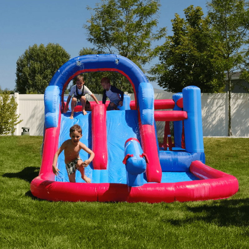 Avyna Royal Wave Bounce House 2 with Water Slide Front View Outside with Kids Playing