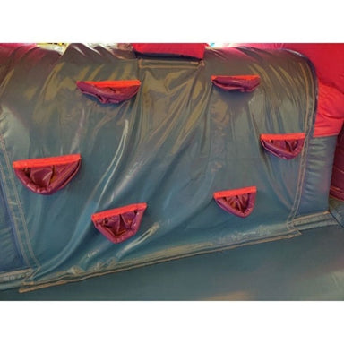 Inside Purple Climbing Foot Holds of Eagle Bounce Bounce House Combo with Slide
