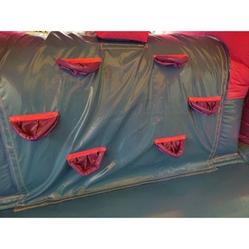 Inside Purple Climbing Foot Holds of Eagle Bounce Bounce House Combo with Slide