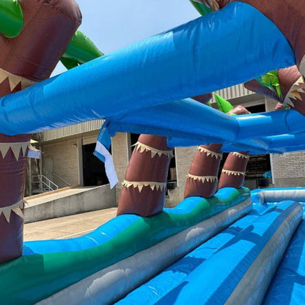 Durable vinyl close-up of dual lane palm tree slip and slide