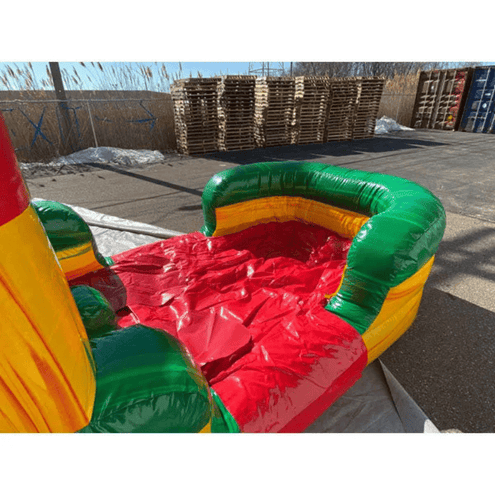 Fiesta bounce house dual slides wet dry combo showing commercial vinyl construction and reinforced seams
