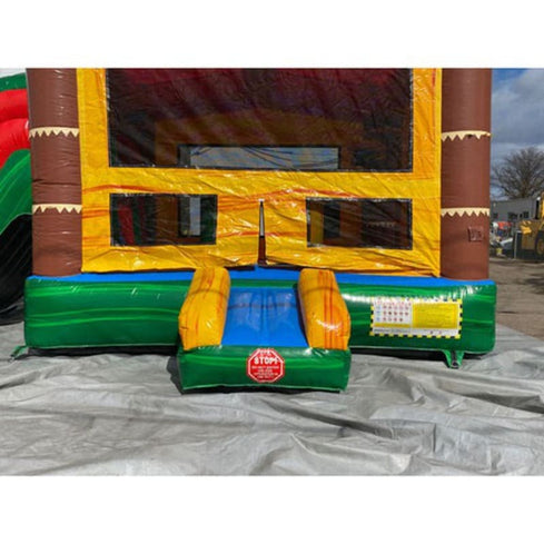 Palm tree bounce house dual slides wet dry combo showing commercial vinyl construction and reinforced seams at entrance