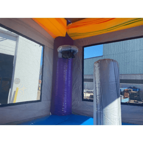 2-lane purple castle bounce house showing pop ups and basketball hoop features