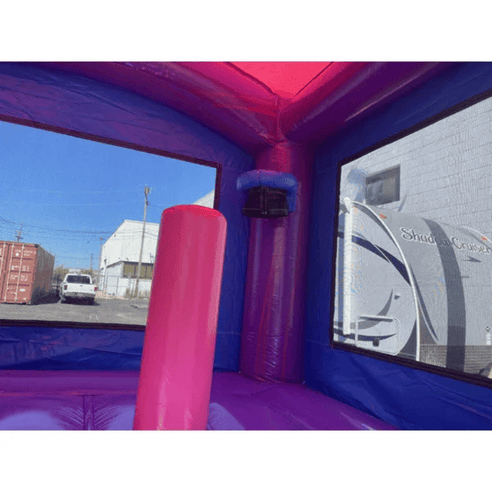 2-lane unicorn combo bounce house inside view of pop ups and basketball hoop