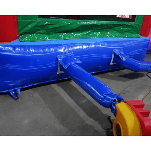 Commercial Moonwalk USA Royal Castle Bounce House showing heavy-duty vinyl construction and reinforced stitching where blower is connected