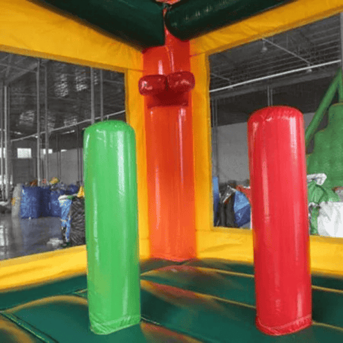 Commercial tropical bouncy castle showing inside pop up features and basketball hoop