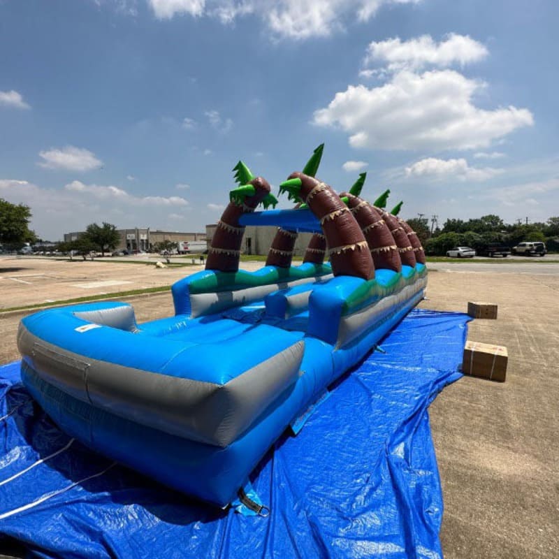 Rear Right View of Eagle Bounce 32ft Palm Tree Dual Lane Slip and Slide